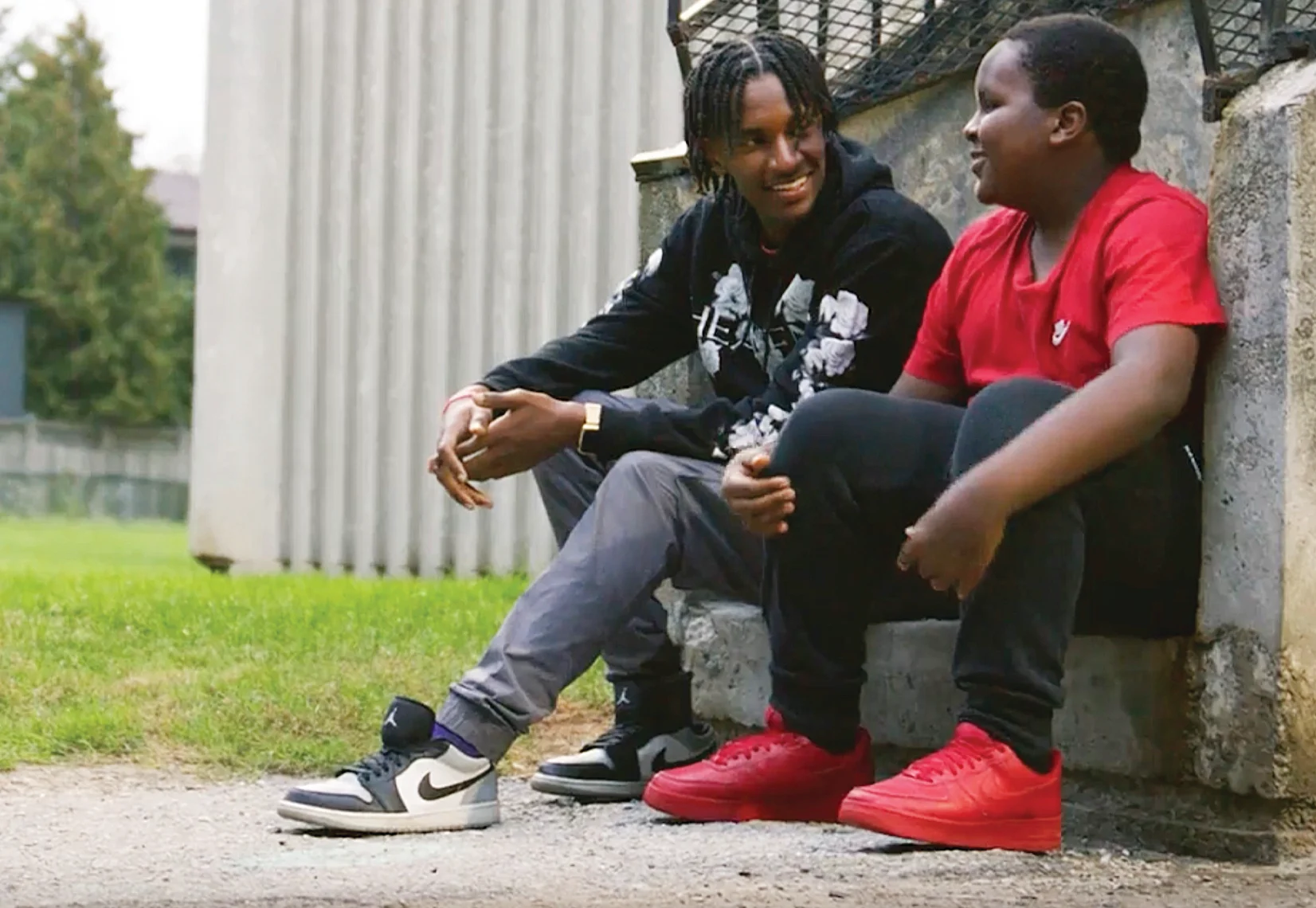 Nebiyou having a conversation with a youth in his community.