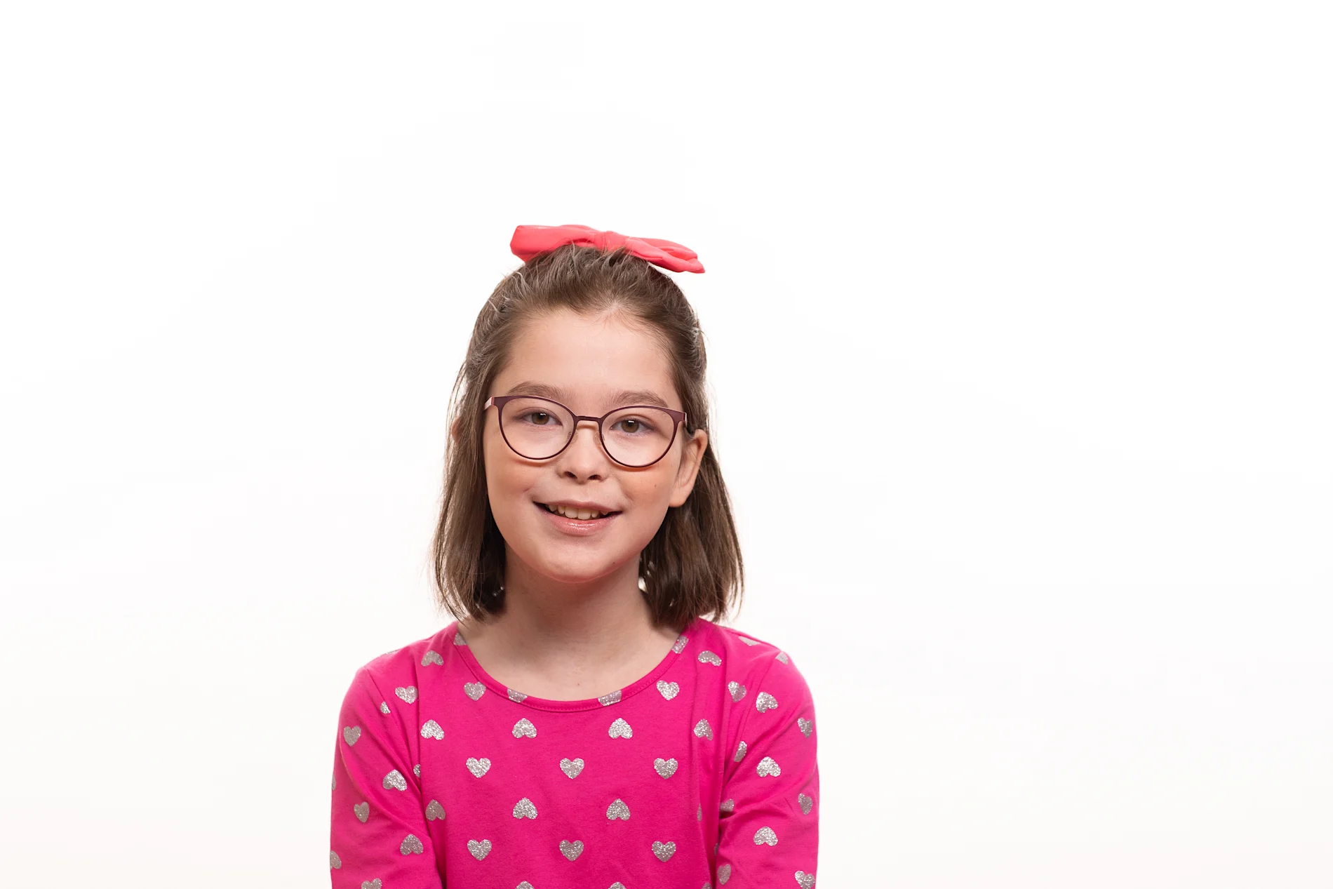 A young person smiling.