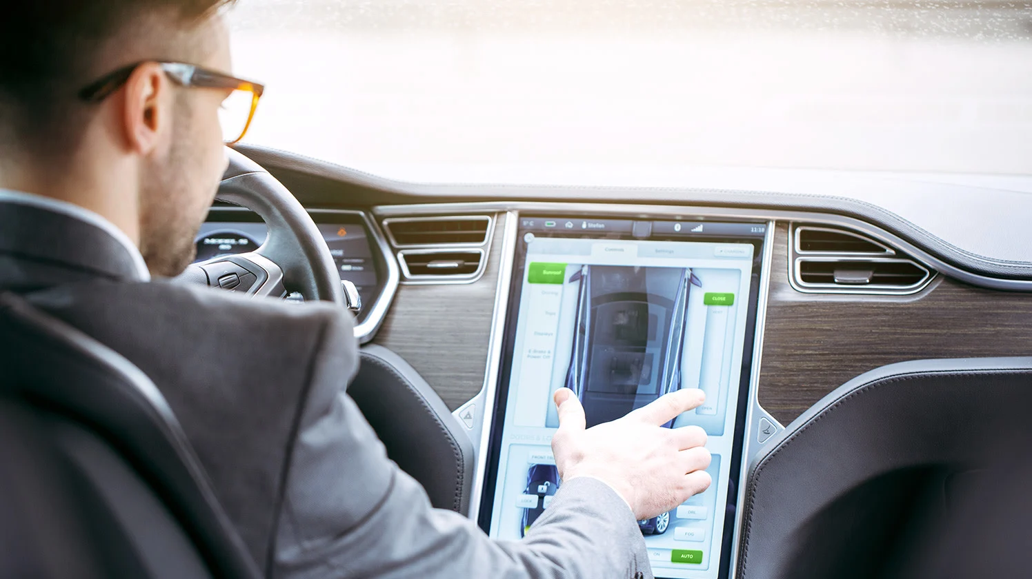 A man driving an automated vehicle