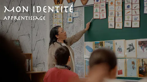 Image of woman teaching a class.