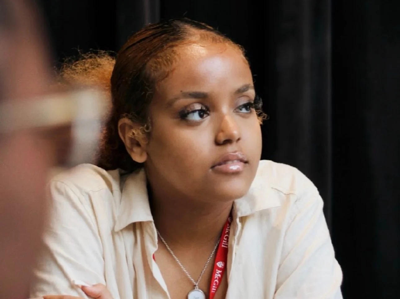 Photo of Blain, a Black, female McGill University student and TELUS Student Bursary recipient