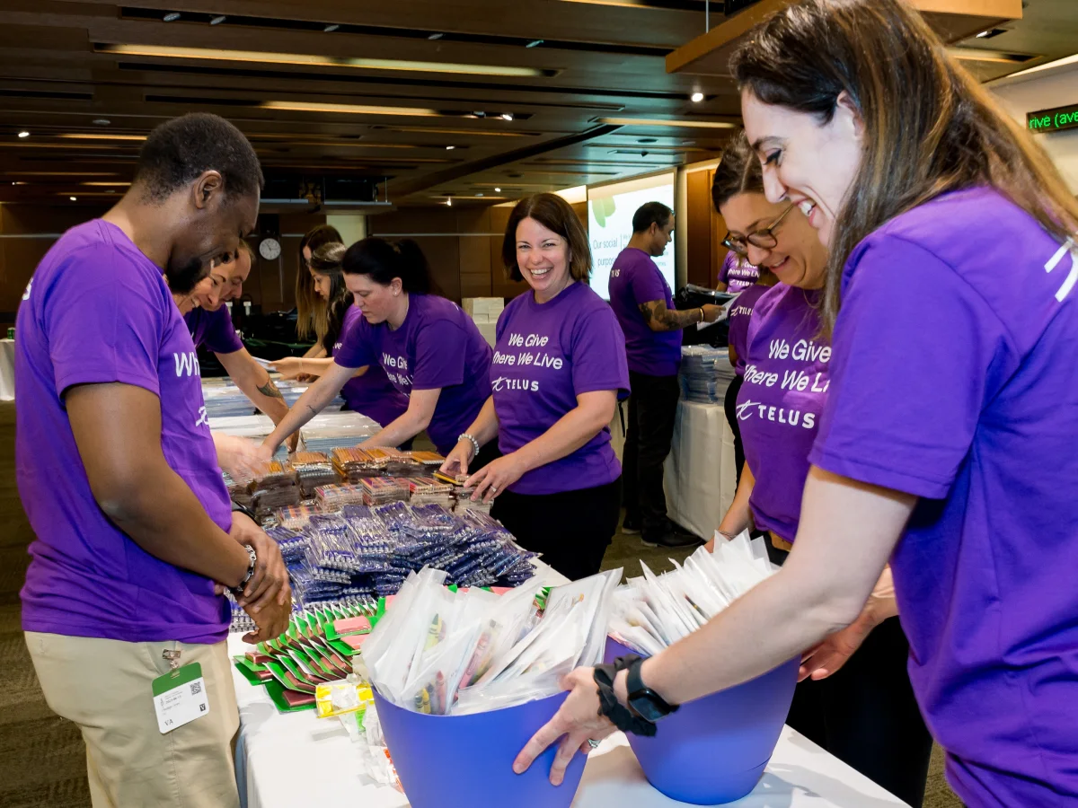 TELUS team members packing school supplies for Kits for Kids.