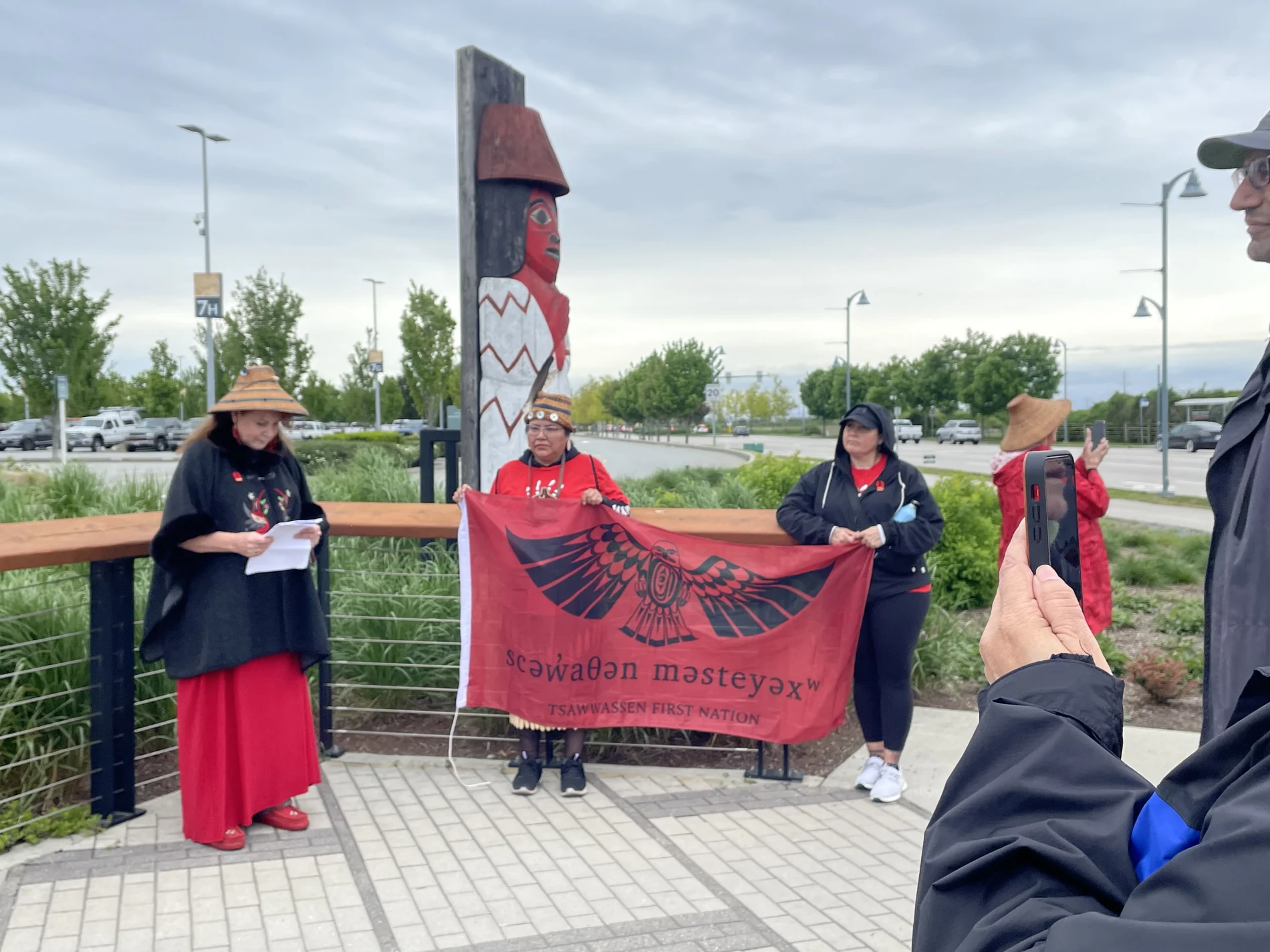 An Indigenous representative speaking on behalf of Tsawwassen First Nation for the opening ceremonies of Walk to End Violence.

