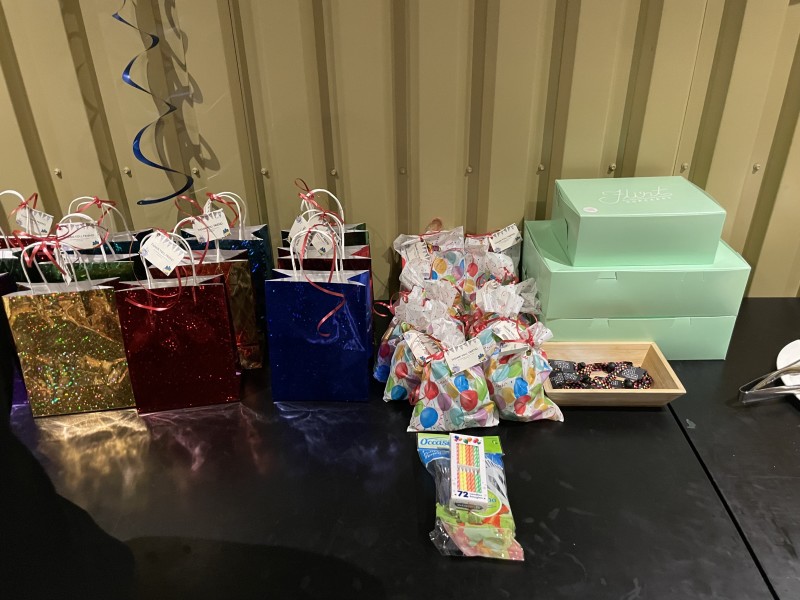 Birthday presents and loot bags from an Autism Edmonton Occasio program birthday party celebration.