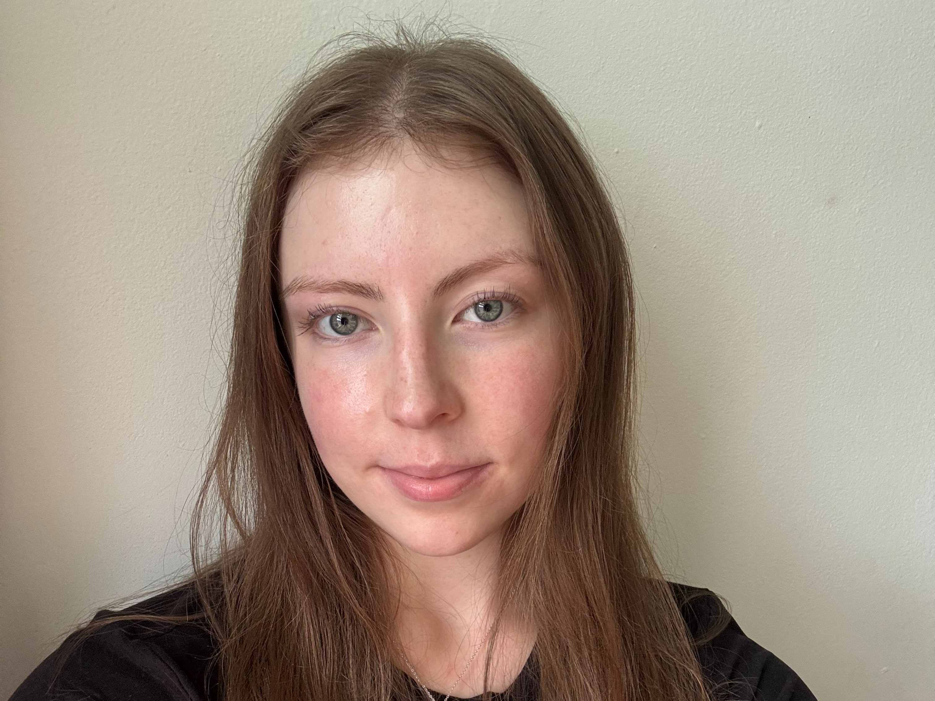 Nickla, Indigenous journalism student and solar innovation entrepreneur, smiling at camera