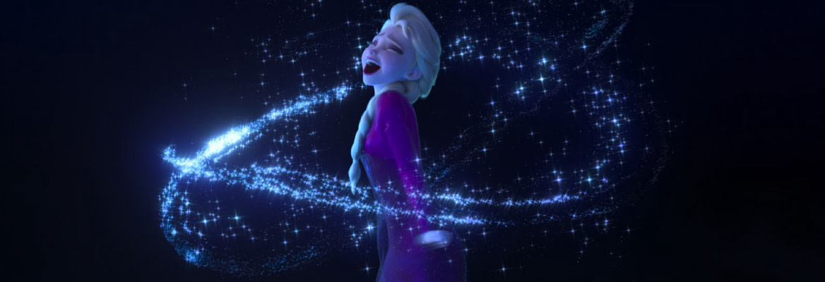 A scene from Disney's Frozen where the character of Elsa is singing exultantly, sparkles flying about her