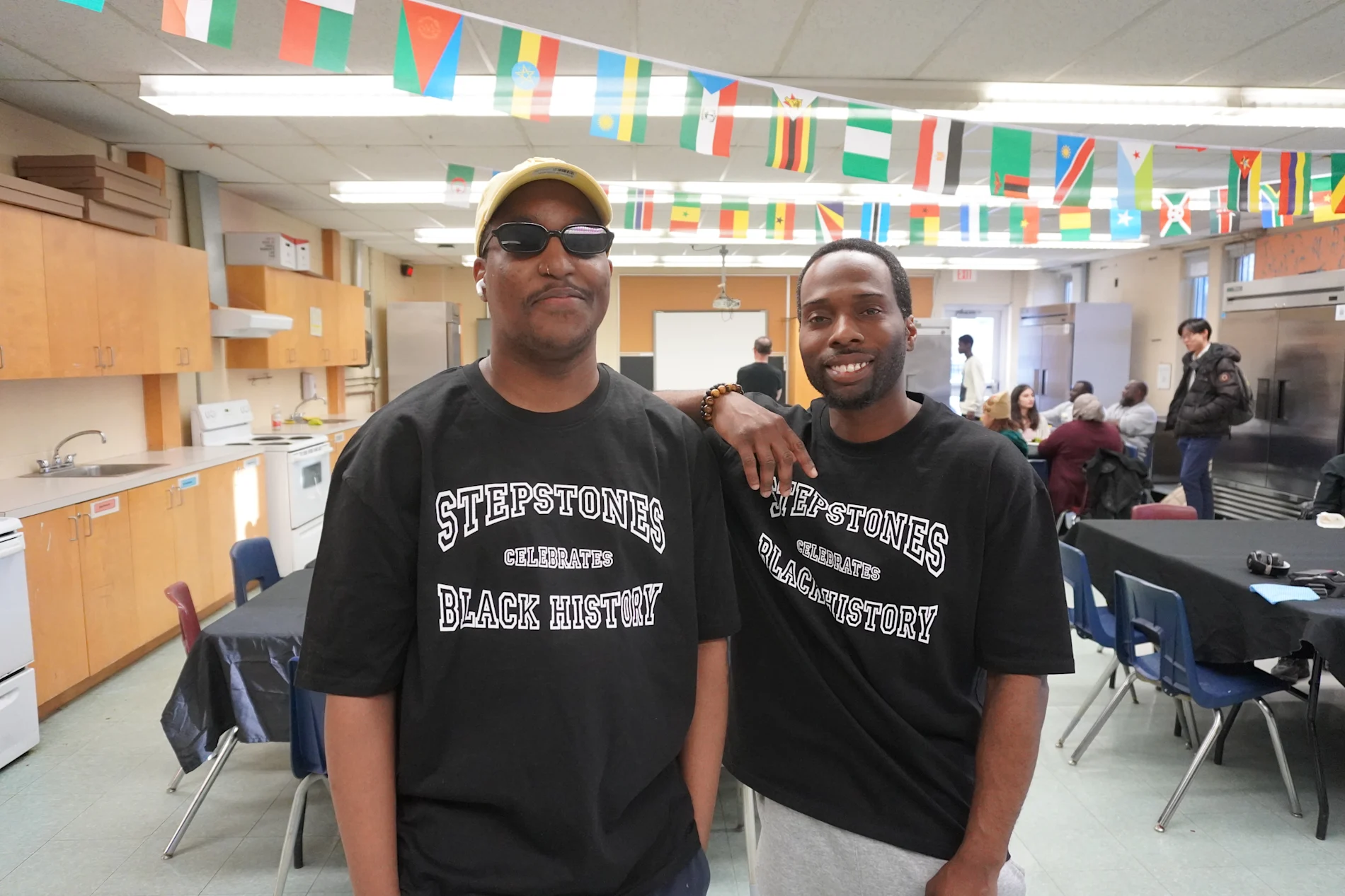 Two men from StepStones program smiling.