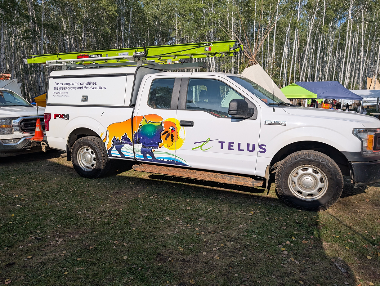 TELUS fleet vehicle with design from artist Lane Meneen