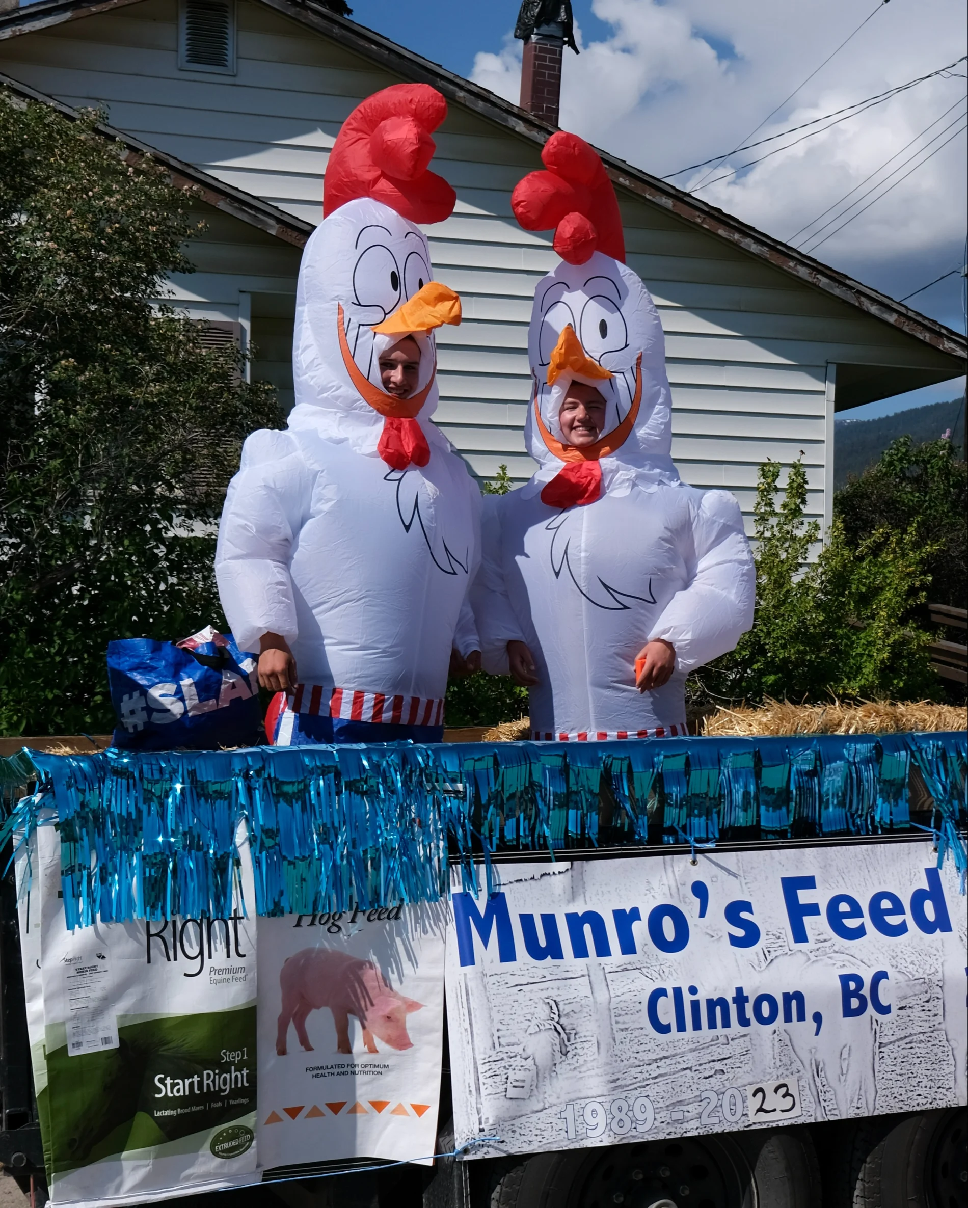 Staff from Munro’s Feed in Clinton dressed as chickens on their business’s parade float. 