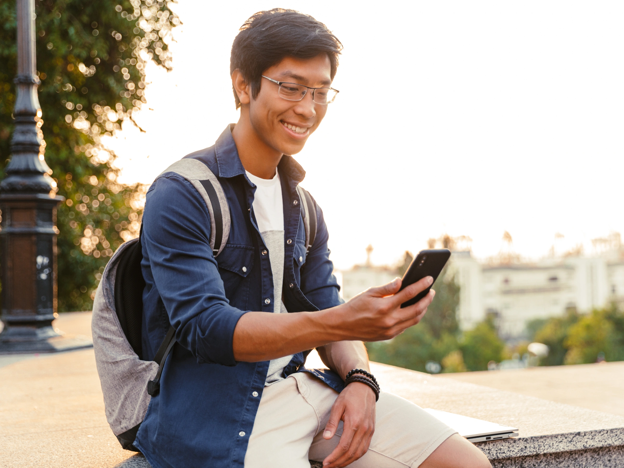 Image of a student looking at their phone