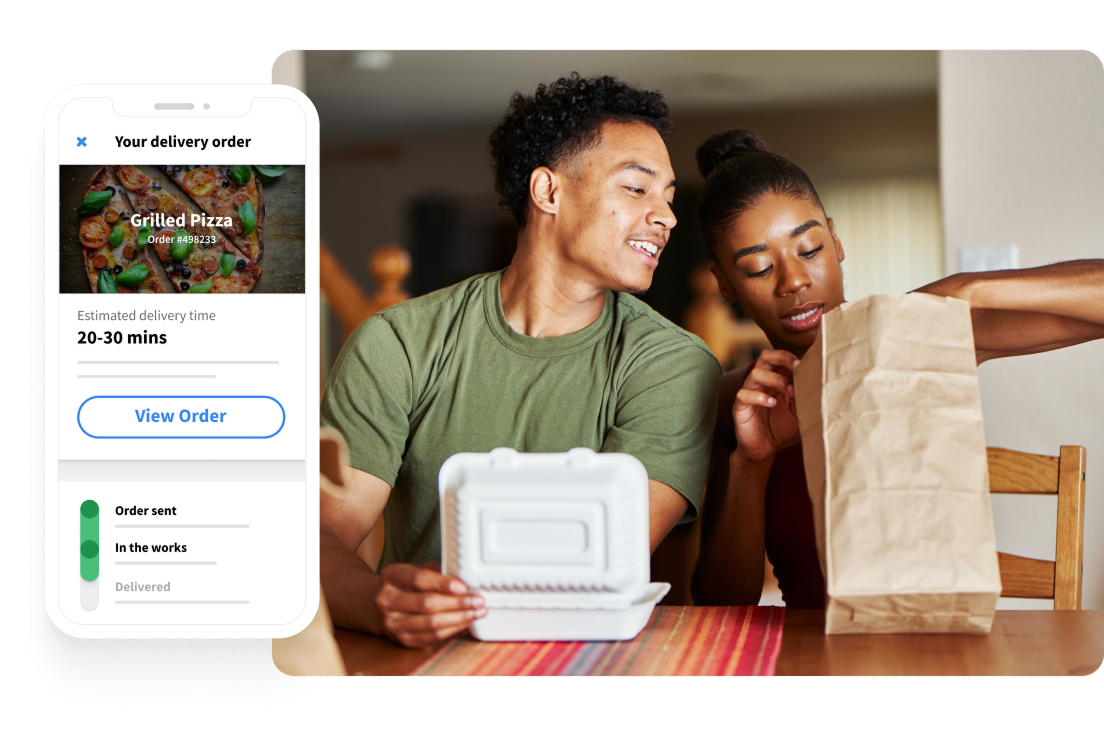 Third Party Delivery Couple looking over their order