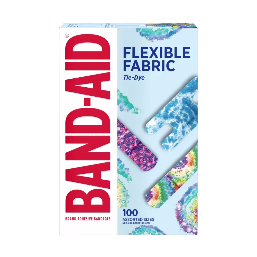 A box of 100 Band-Aid Brand adhesive bandages. The bandages are flexible fabric with a tie-dye pattern in assorted colors and sizes