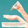 Scalp Care Soothe & Strengthen Serum with Rosemary Oil dripping product into hand
