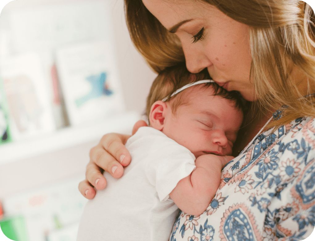 New mother holding her baby.