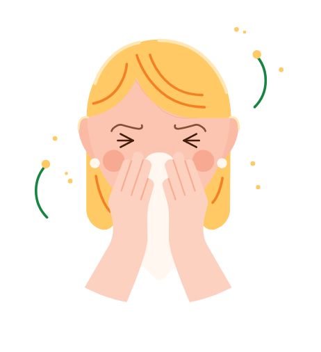 Woman blowing her nose