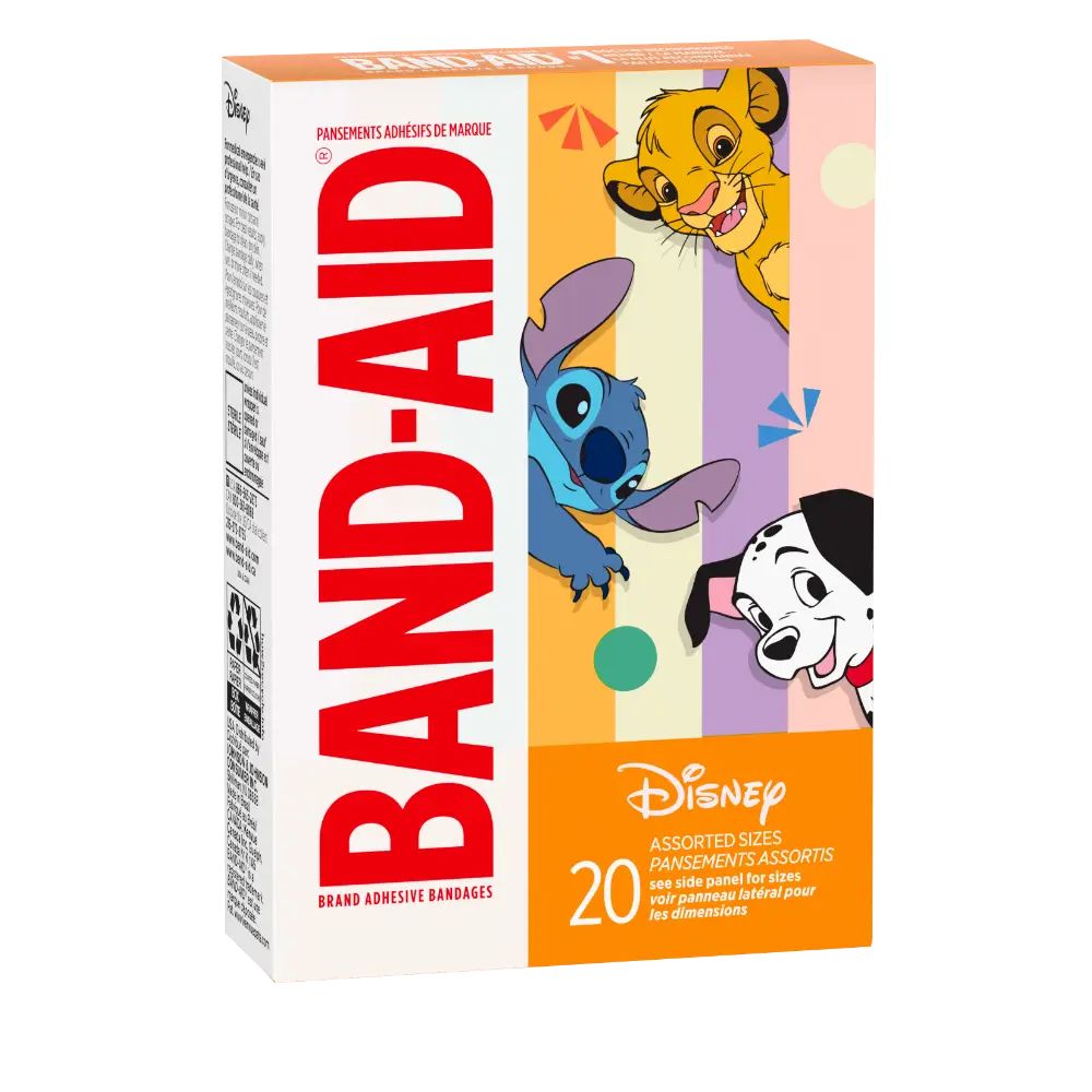 a box of 20 Band-Aid ® brand adhesive bandages, each one tribute to Simba from The Lion King, Stitch from Lilo & Stitch, and Pongo from 101 Dalmatians