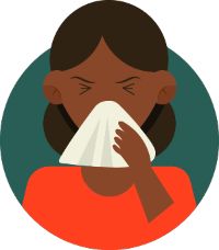 Woman sneezing from a mold allergy