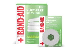 Band-Aid Hurt-Free Non-Stick Pads and Hurt-Free Wrap packaging, featuring green and white design with red Band-Aid logo and a cross symbol.