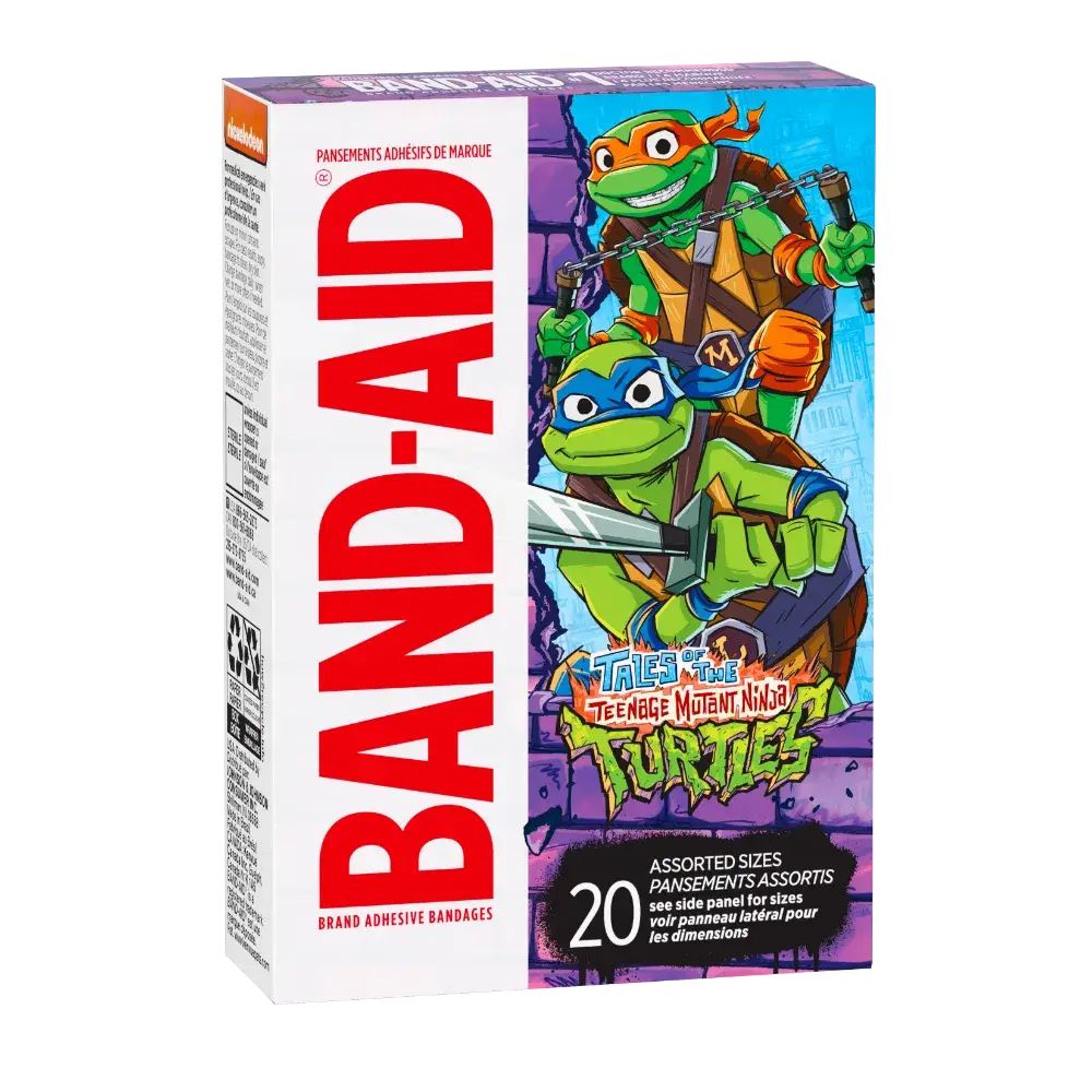 Imagine a box of Band-Aid brand adhesive bandages in vibrant purple, featuring Leonardo and Michelangelo from the Teenage Mutant Ninja Turtles. The iconic "BAND-AID" logo is in red, and it includes a collection of 20 assorted sizes, ready for action!