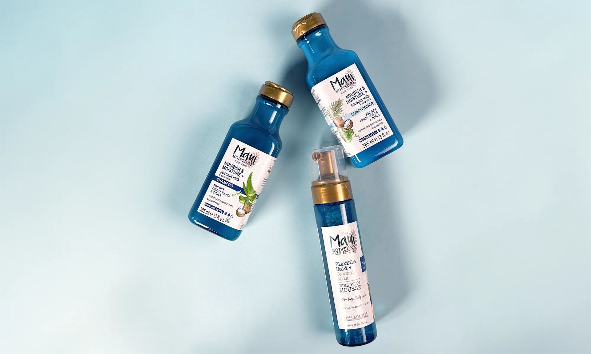 Maui Moisture® Nourish & Moisture + Coconut Milk product line, including shampoo, conditioner and curl foam mousse