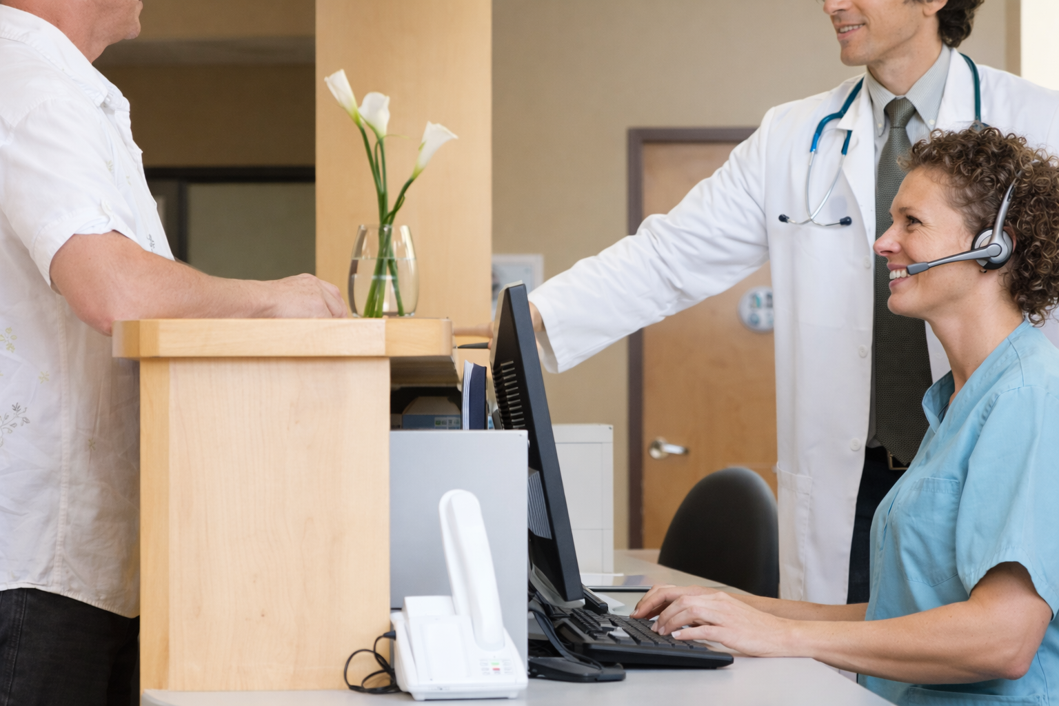 Medical office reception interaction 