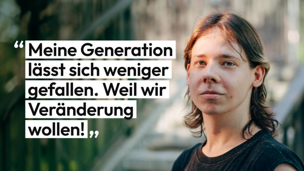 Kyo schaut in die Kamera. Er sagt: 