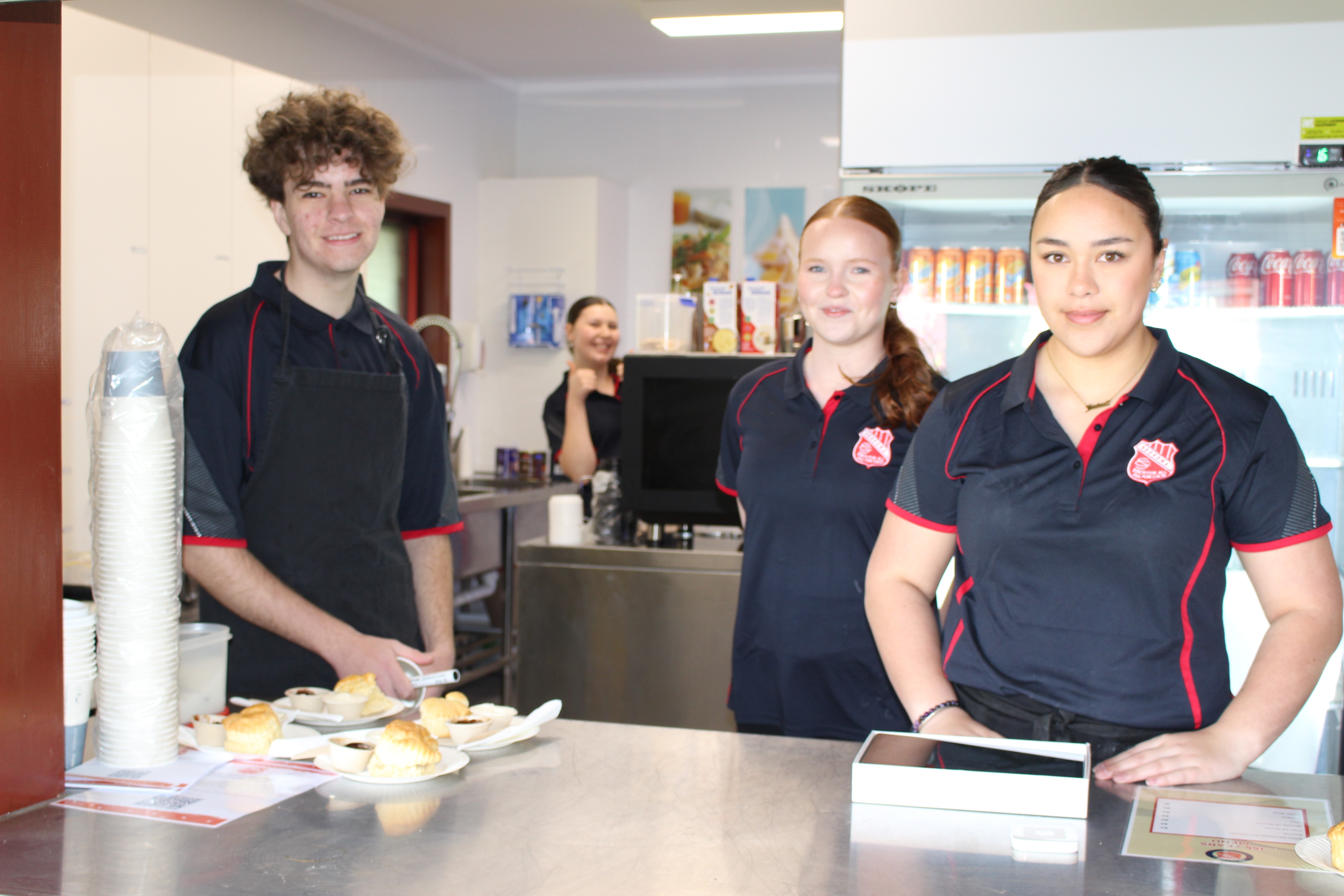 Open School - Hospitality students serving coffee