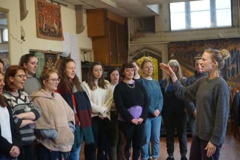 Members of SHE Choir Bristol rehearsing