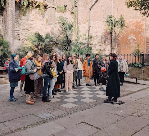 SHE Choir Hastings performing in Hastings Old Town