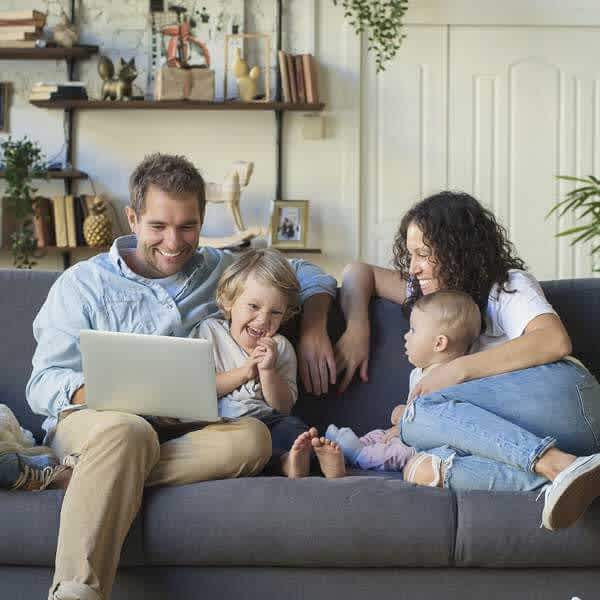 Family Sitting on Couch​