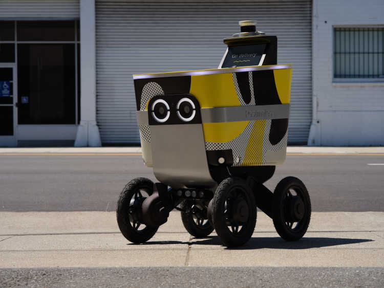 An Ouster lidar sensor on a delivery robot