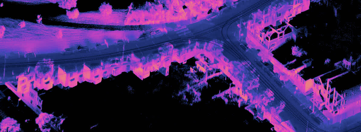 A lidar point cloud of an intersection and buildings