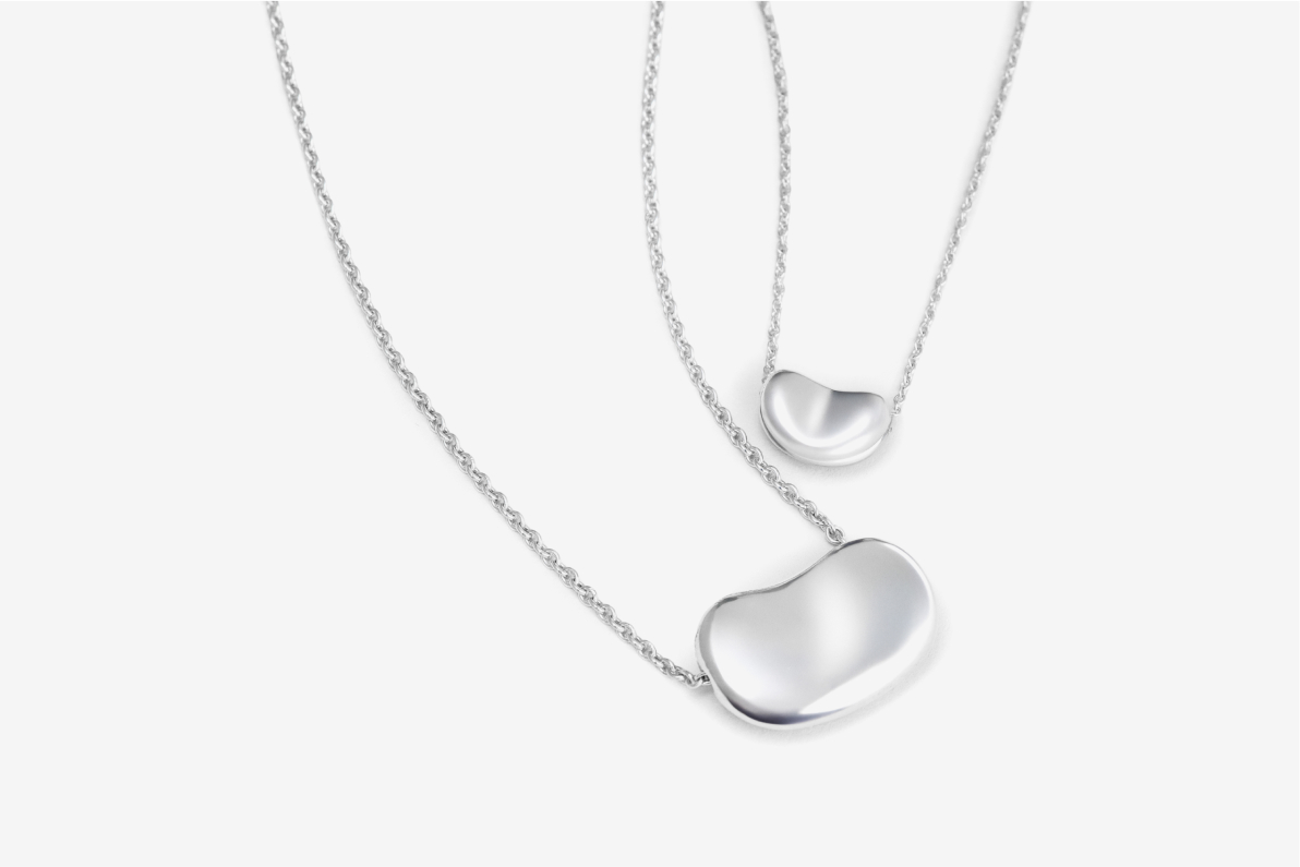 two Tiffany sterling silver Elsa Peretti bean pendant necklaces
