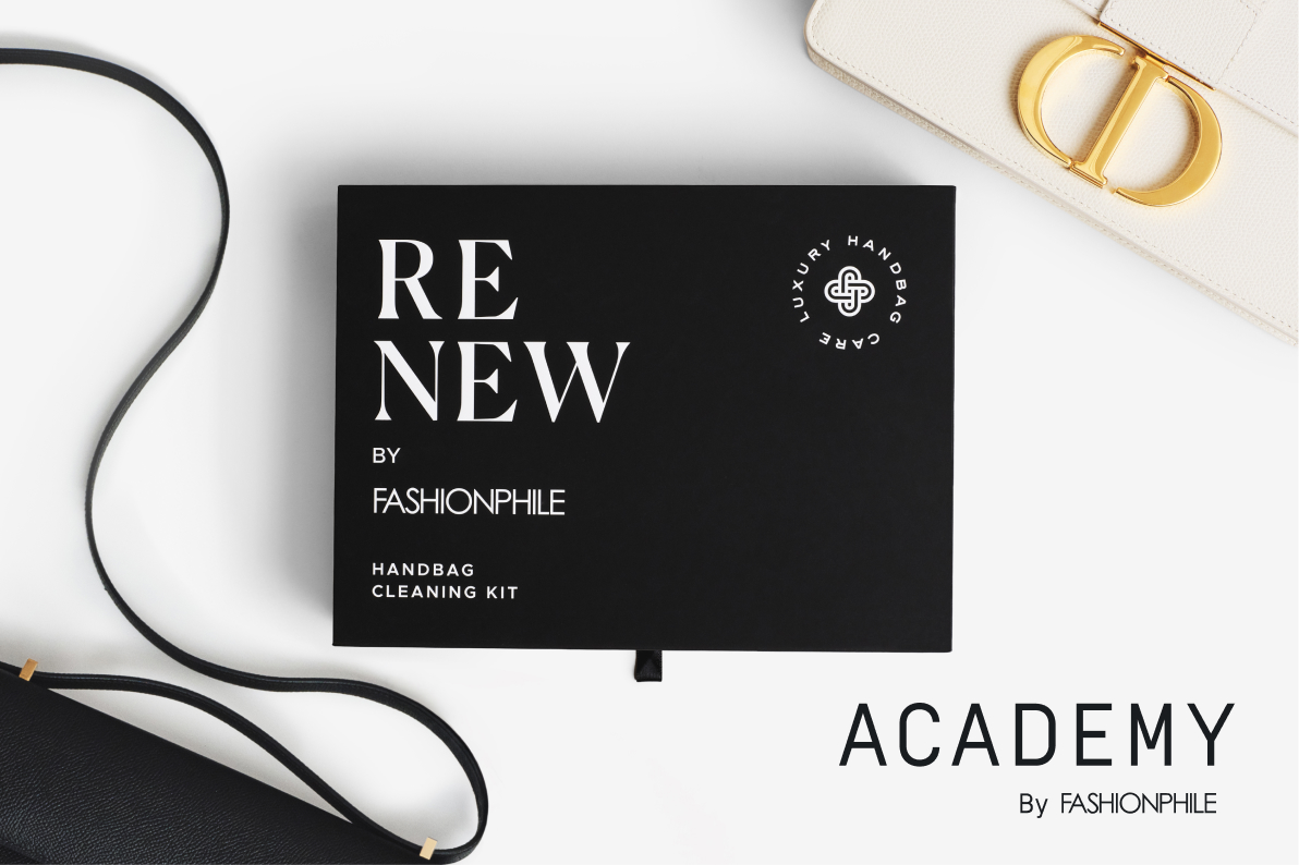 The ReNew Kit by Fashionphile box surrounded by one white Christian Dior Montaigne and one black Hermes Constance