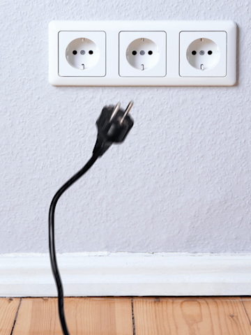 Steckdose mit herausgezogenem Stecker