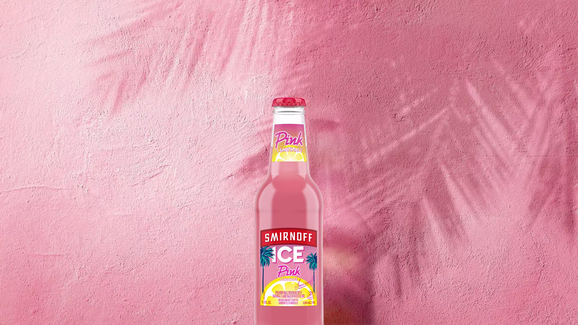 Smirnoff Ice Pink Lemonade on a tropical background