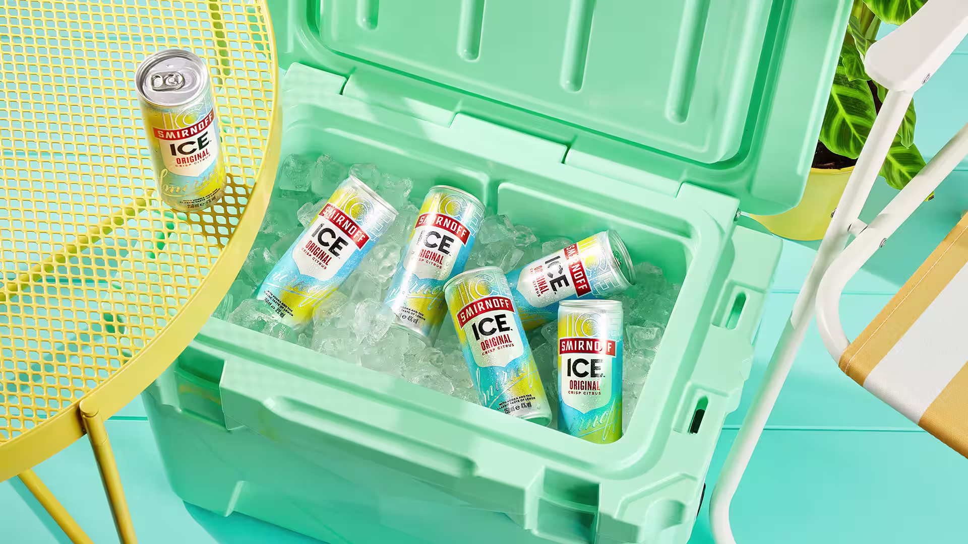 Three bottles of smirnoff ice in an ice bucket