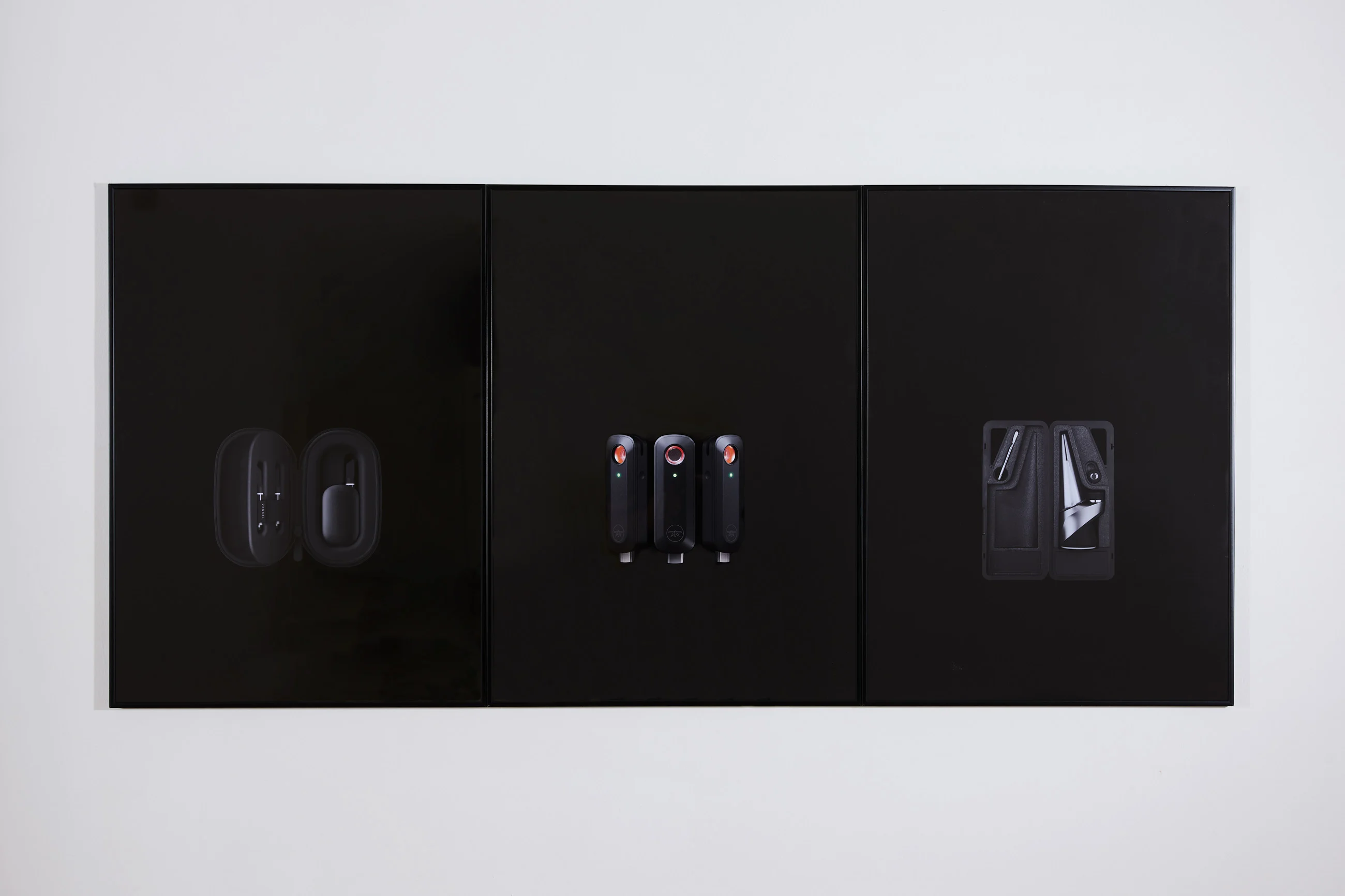 Three black panels against a white background, each displaying different black objects or tools with minimalist designs.