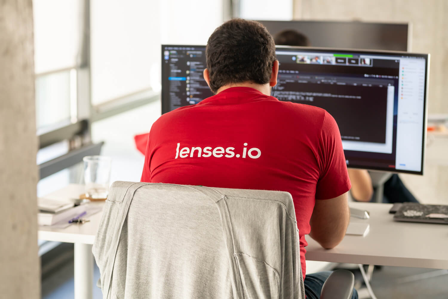 lenses.io developer working in office 