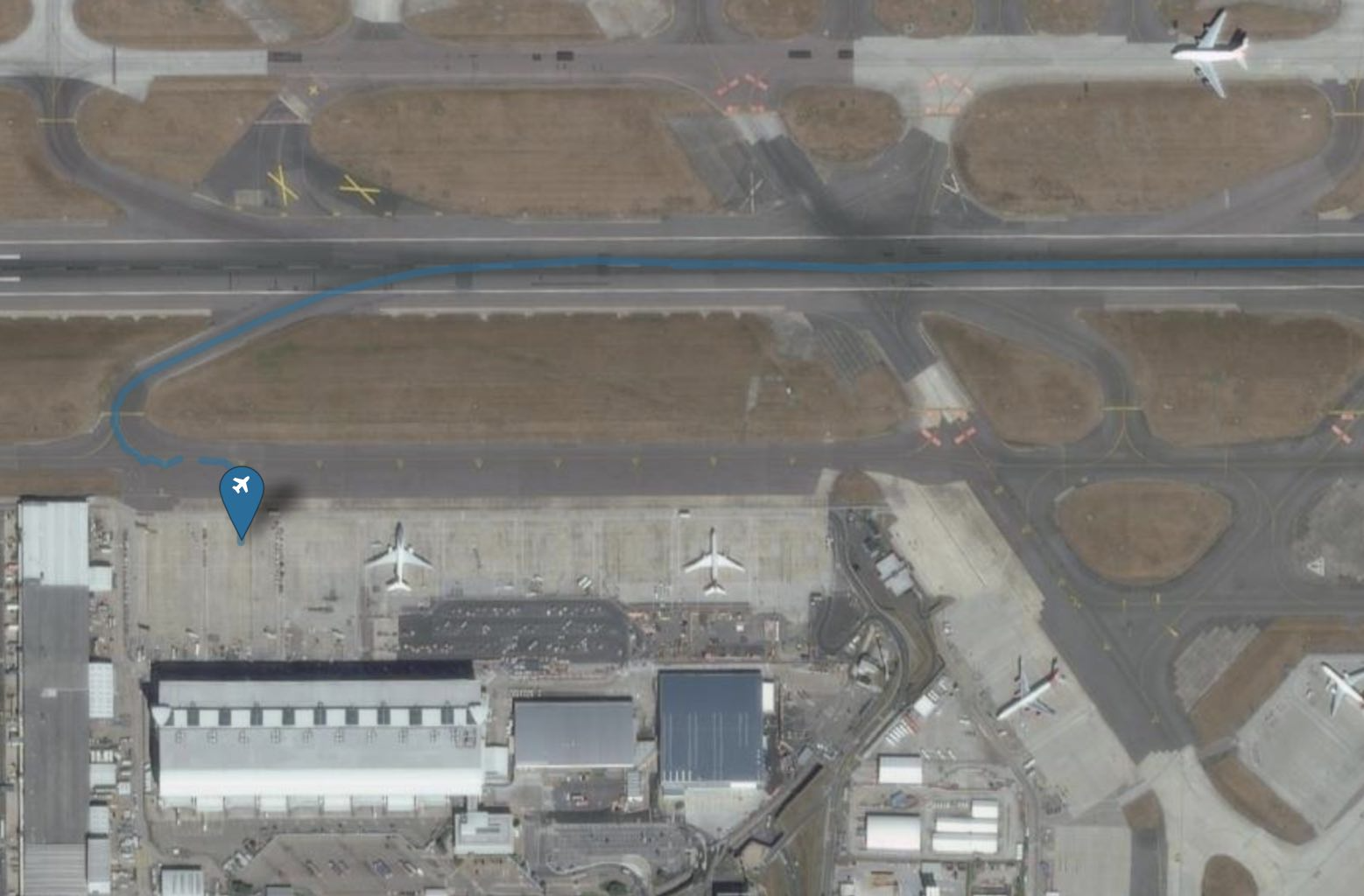 Airfield and plane at gate for geo-spatial analysis