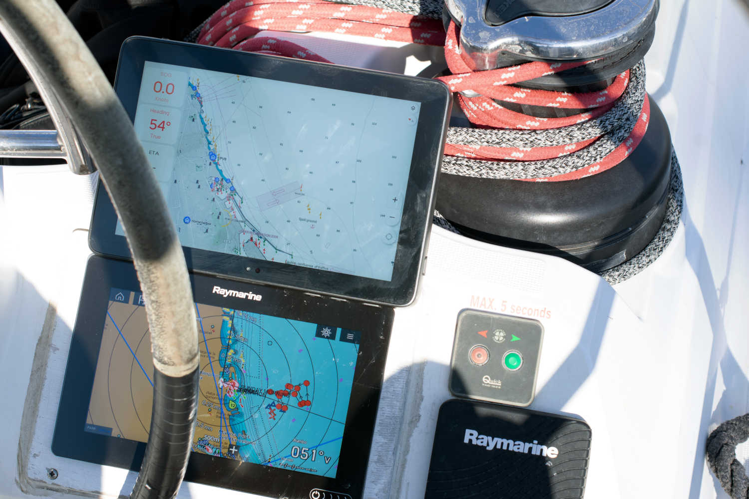 Orca Display 2 (top) and a Raymarine Axiom 2021 (bottom) at full brightness under direct sunlight in the Mediterranean.