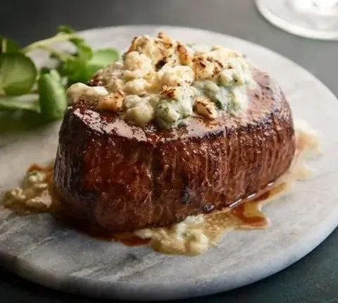morton-s the steakhouse - filet with sauce