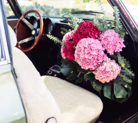 Flowers in passenger seat of car