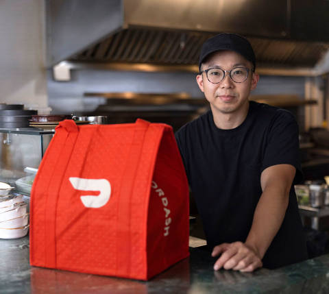 Jonathan Poon of Favorites with DoorDash Bag 