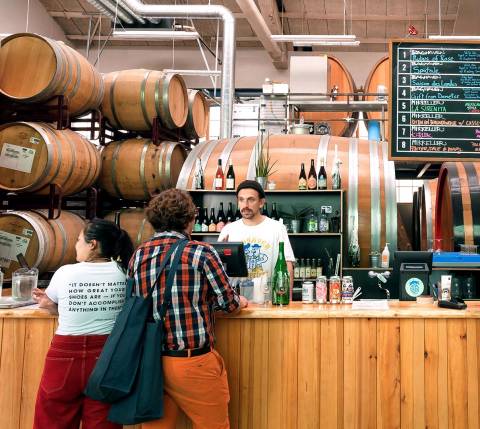 Mx Blog - How to Build Community Using Local Producers - ordering at brewery counter