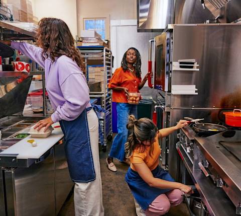 Mx restaurant kitchen staff working