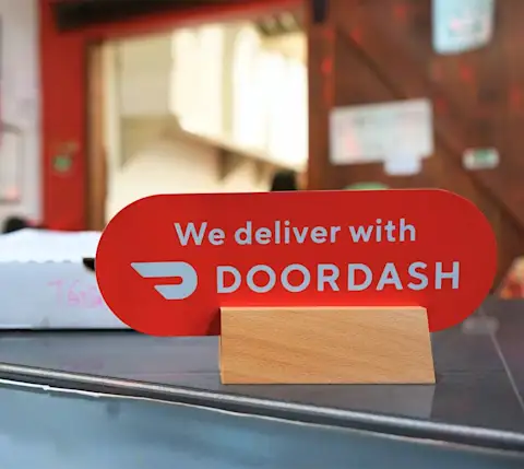 mx deliver with doordash sign