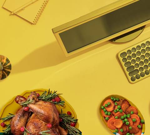 Thanksgiving turkey set beside a computer