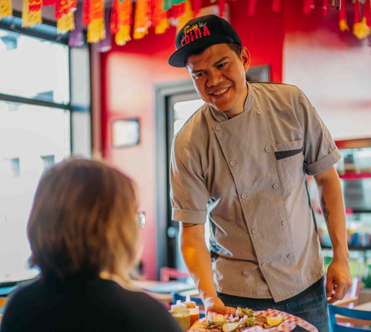 Customer being served at Tacos Frida