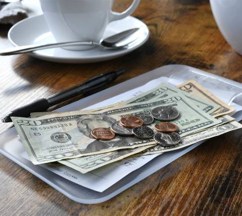 Mx Blog (US) - Why Restaurant Owners Should Be Paying Tips Through Payroll - Cash and coins